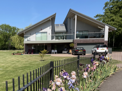 New house that has a butterfly roof