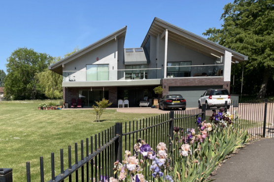 New house that has a butterfly roof