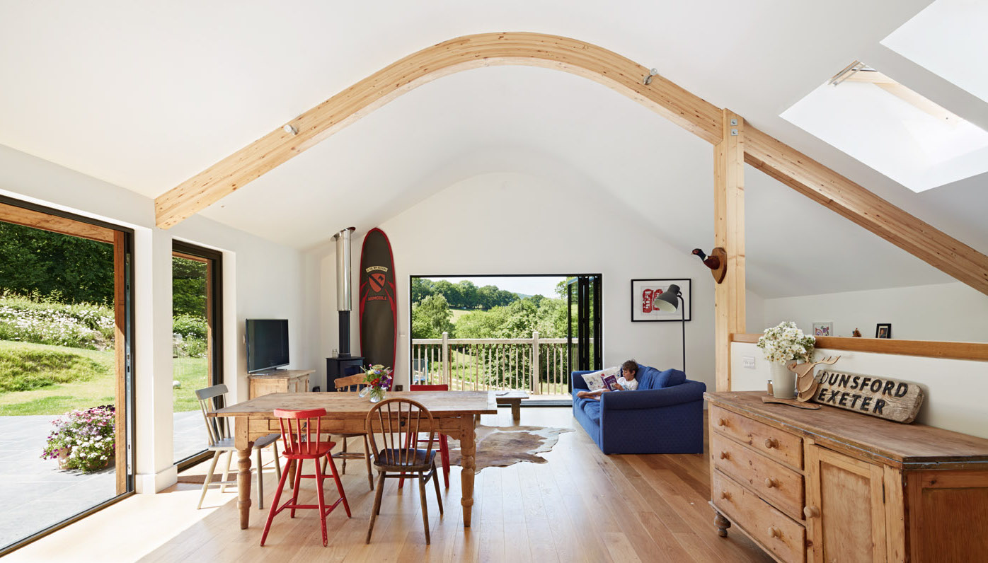A light and airy family living room with a curved ceiling